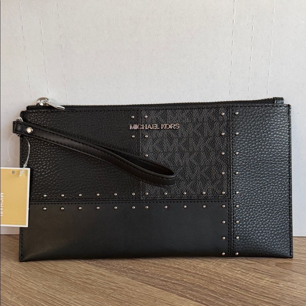 Michael Kors Large Jet Set Travel wristlet bag with patches, studs